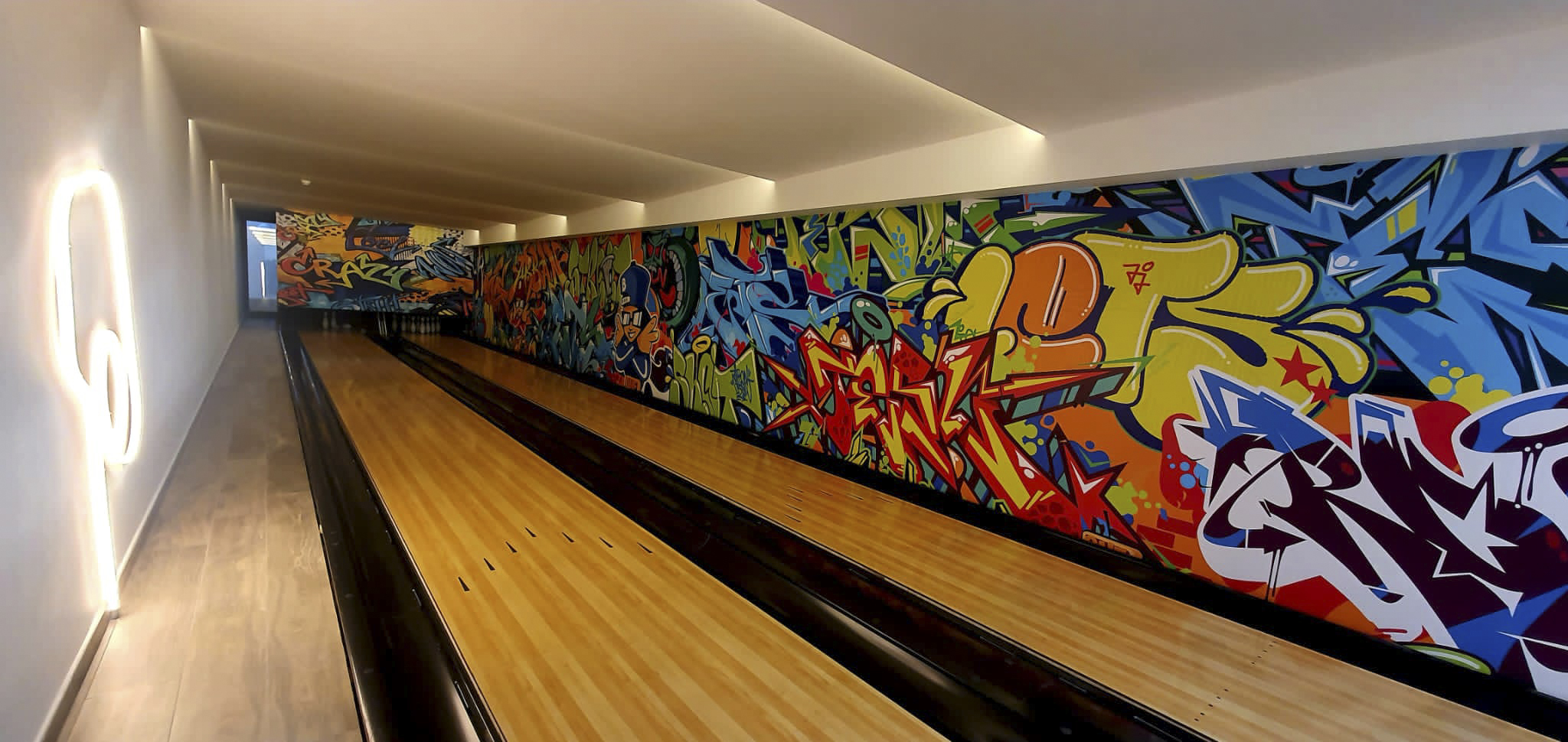 Astral projects bowling alley Smart Lighting and Audio Control System
